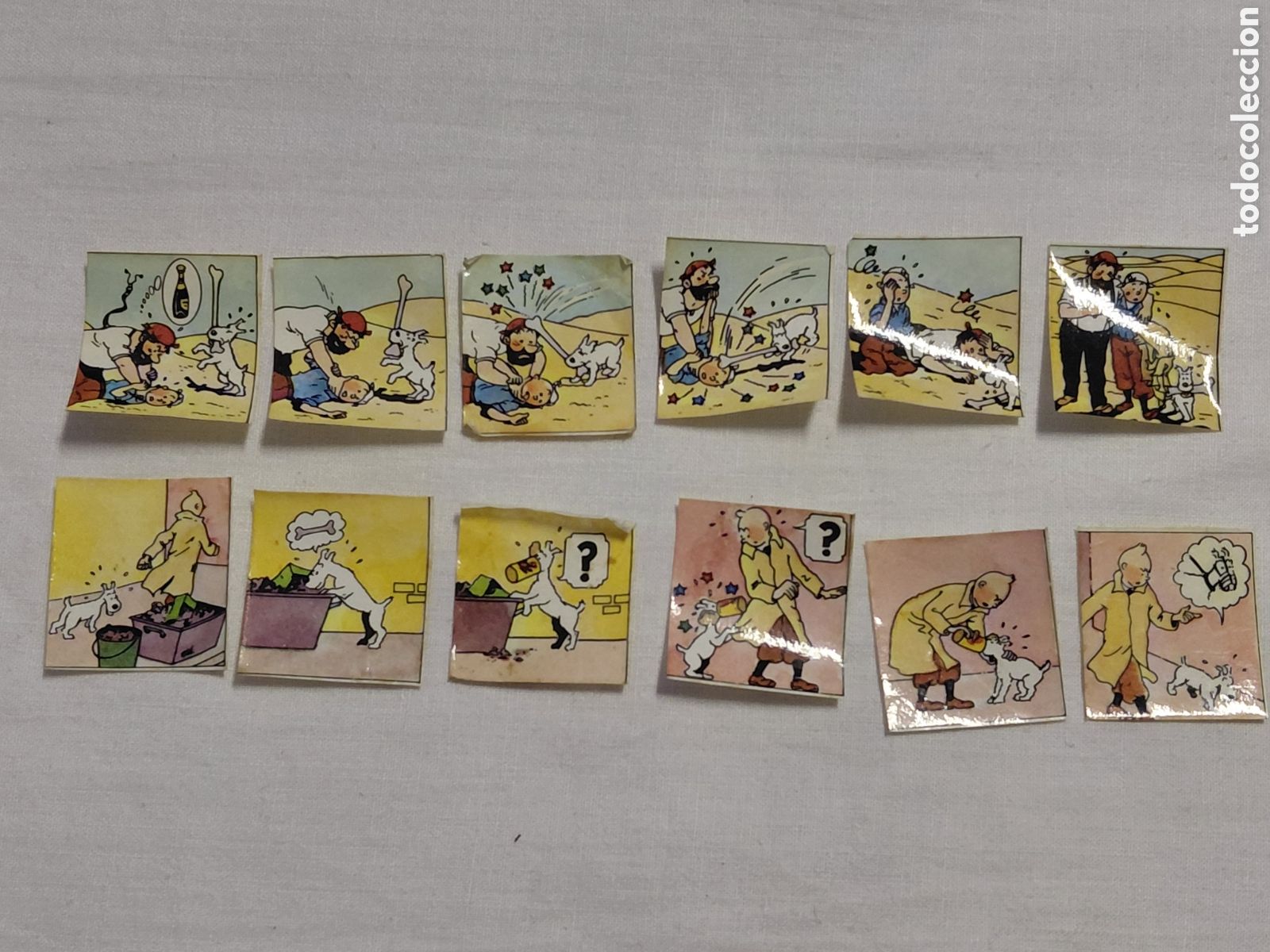Coleccionismo cromos antiguos: TINTIN 2 TIRAS ADHESIVAS PANRICO A&Ntilde;OS 80.HAN ESTADO PEGADAS EN LA PORTADA DE UN LIBRO