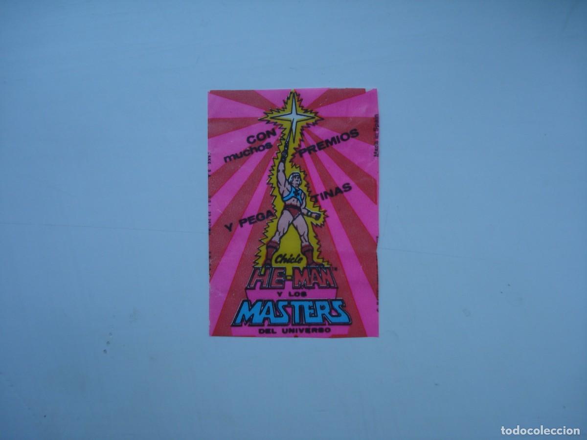 Coleccionismo cromos antiguos: HE-MAN MASTERS JAKE ENVOLTORIO CROMOS CHICLES! HEMAN WRAPPER KAUGUMMI BILDER BUBBLE GUM!