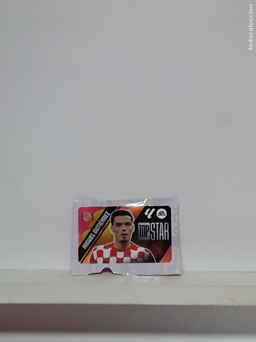 Coleccionismo cromos antiguos: LALIGA ESTE 2025 2026 EA SPORTS 25 26 ALBUM PANINI LIGA N GIRONA CHICLE TOP STAR MIGUEL GUTIERREZ