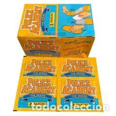 Colecionismo Cromos antigos: LOCA ACADEMIA DE POLICIA, CAJA DE 100 SOBRES DE CROMOS SIN ABRIR
