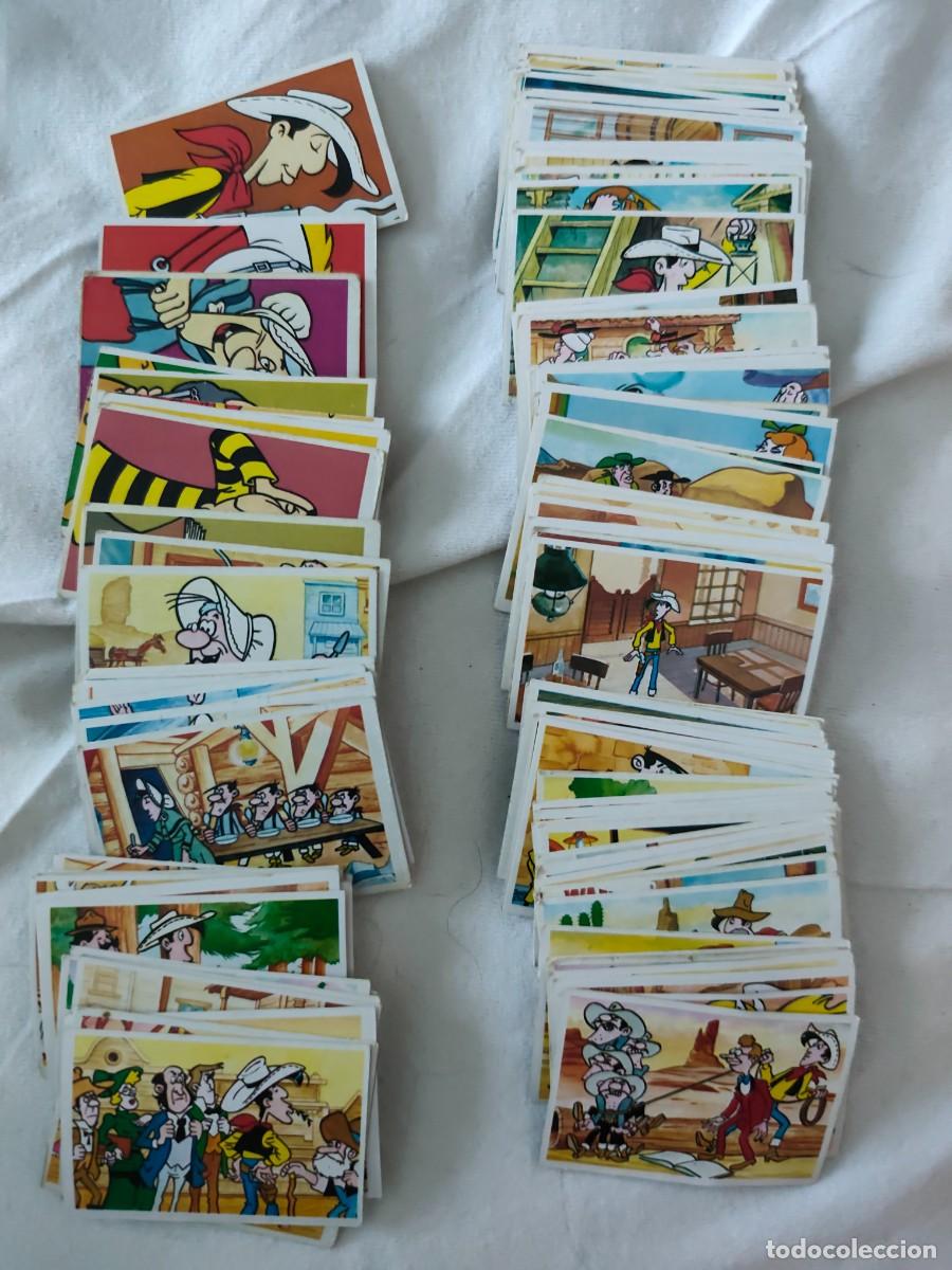 Coleccionismo cromos antiguos: Lote unos 100 cromos LUCKY LUKE EDITORIAL ESTE DARGAUD 1985 MORRIS EXITO T.V sin pegar sin repetir