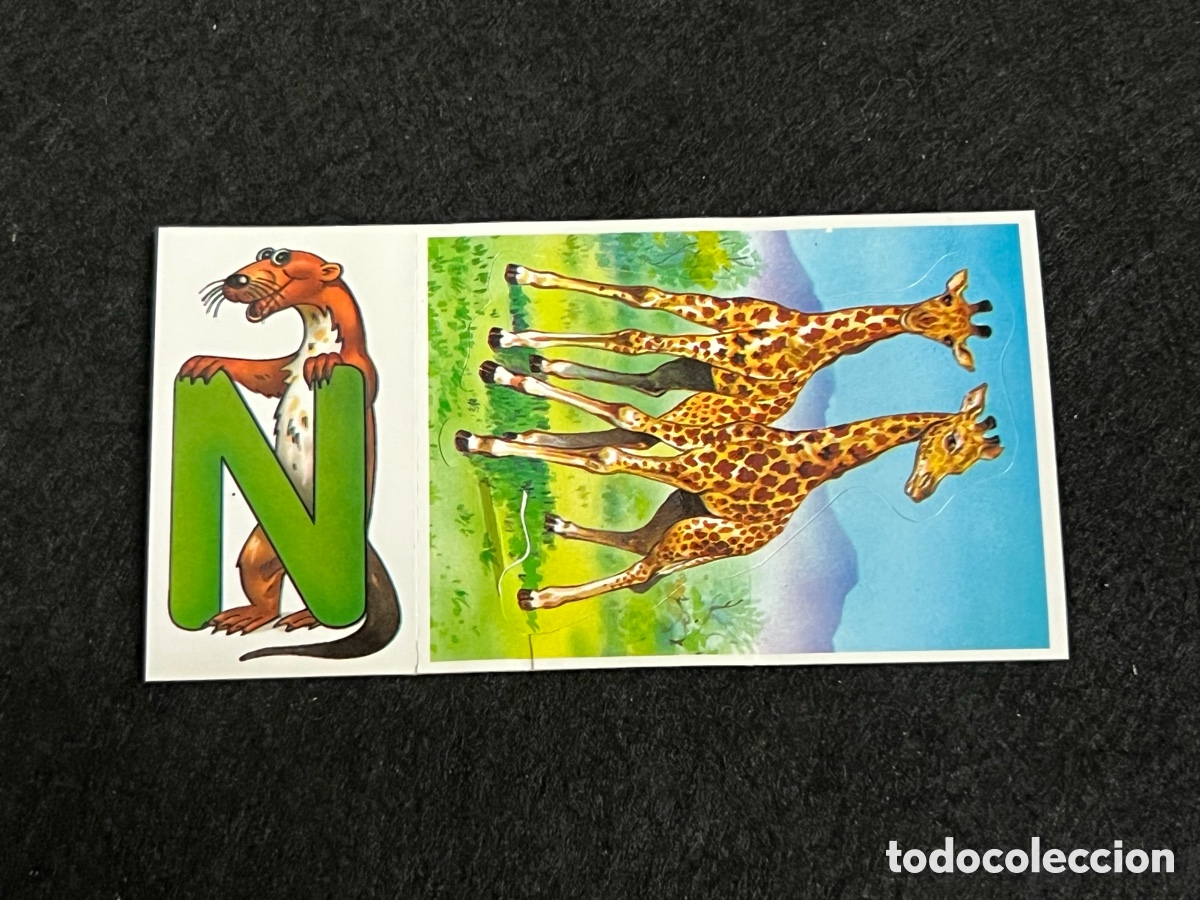 Coleccionismo cromos antiguos: CROMO BOLLYCAO FAUNA EN PELIGRO JIRAFA 38 ANIMALETRAS LETRA N NUTRIA.