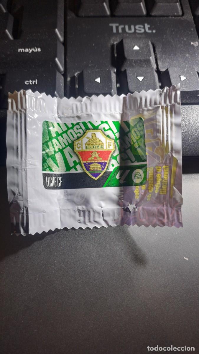 Coleccionismo cromos antiguos: CROMO ESCUDO ELCHE CHICLE LIGA 2026 2027 26 27 ESTE PANINI NUNCA PEGADO