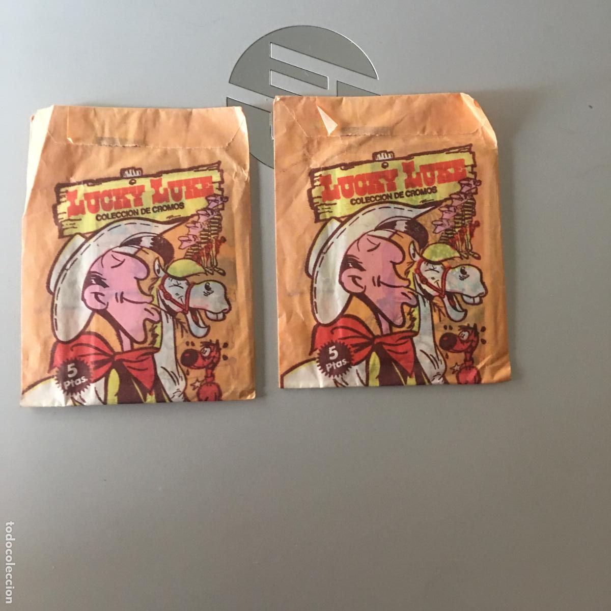 Coleccionismo cromos antiguos: LUCKY LUKE 2 SOBRES SIN ABRIR