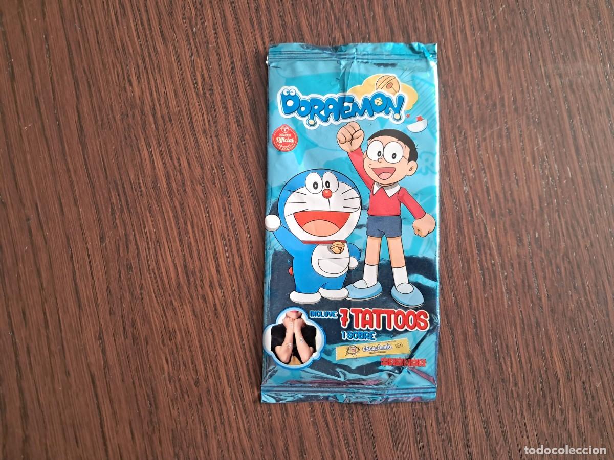 Coleccionismo cromos antiguos: sobre vac&iacute;o de cromos, tattoos de Doraemon, Oxygen. - Foto 1