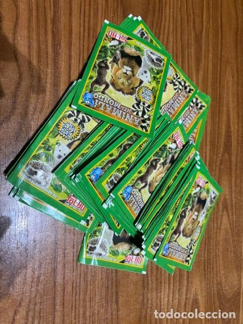 Coleccionismo cromos antiguos: Lote de 50 sobres de cromos animali nel mondo, sin abrir, italianos