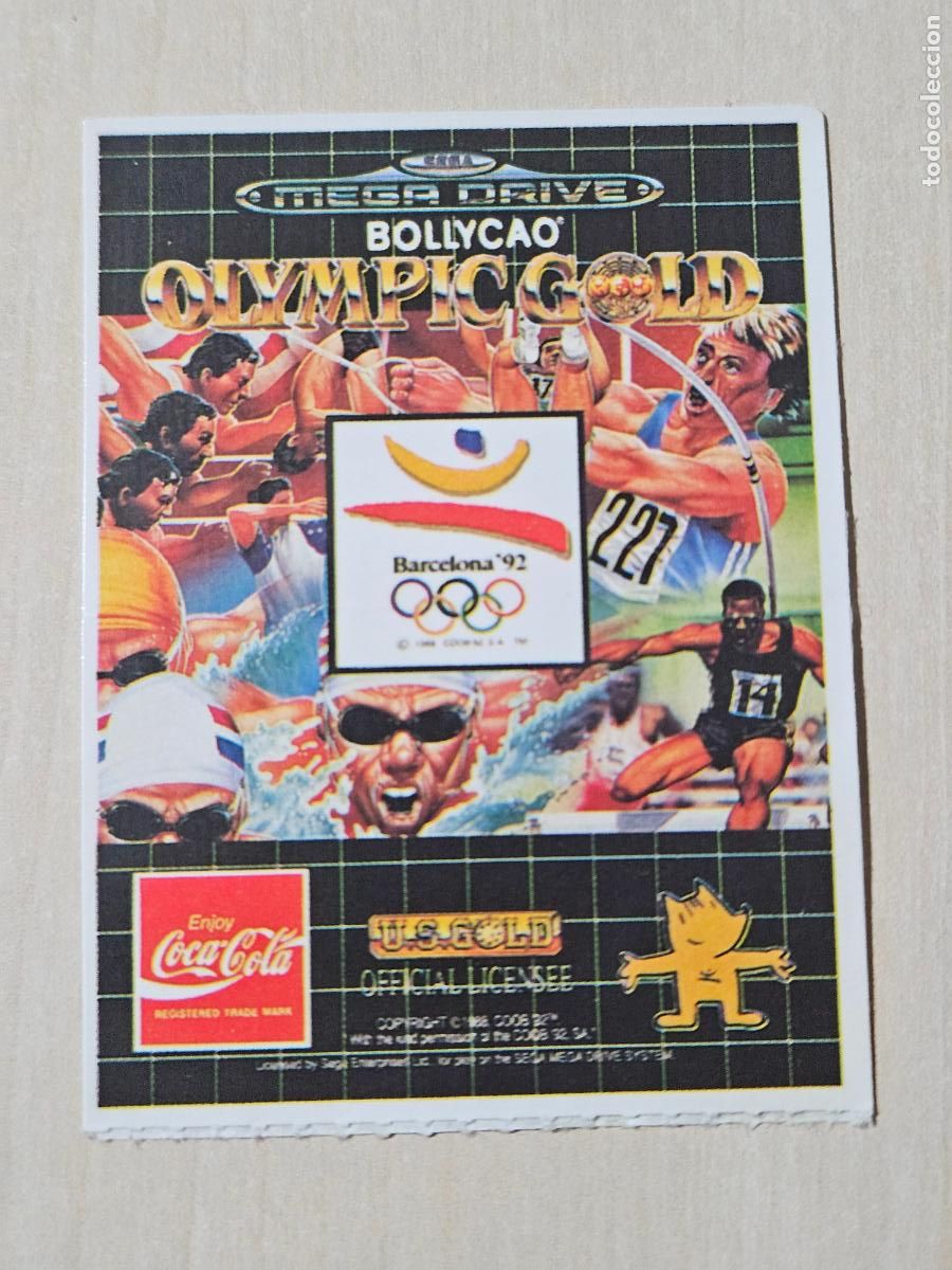 Coleccionismo cromos antiguos: OLYMPIC GOLD CROMO PEGATINA ADHESIVO BOLLYCAO - SEGA - MEGA DRIVE NUEVA SIN PEGAR