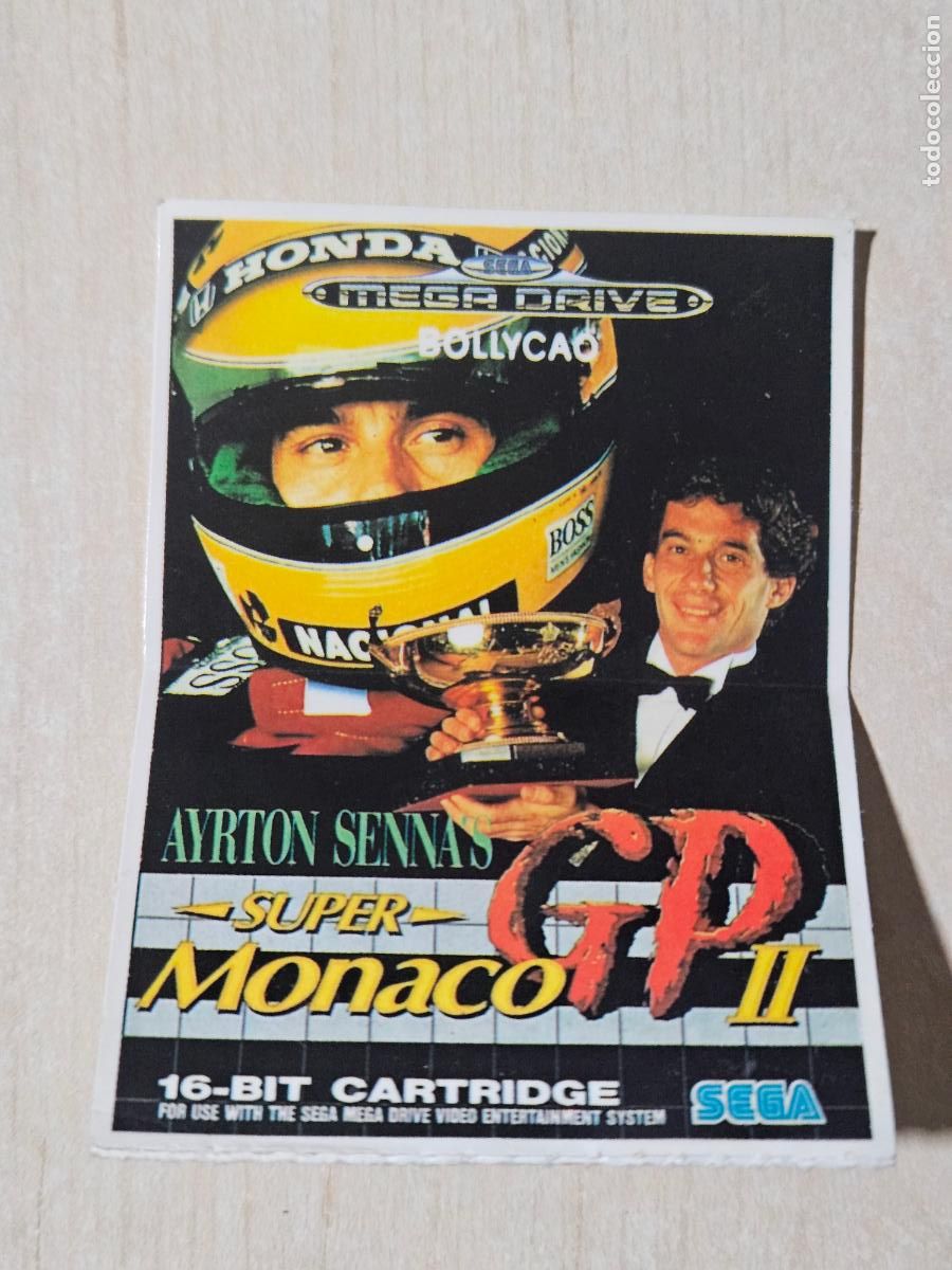 Coleccionismo cromos antiguos: AYRTON SENNA SUPER MONACO GP II CROMO PEGATINA ADHESIVO BOLLYCAO - SEGA - MEGA DRIVE NUEVA SIN PEGAR