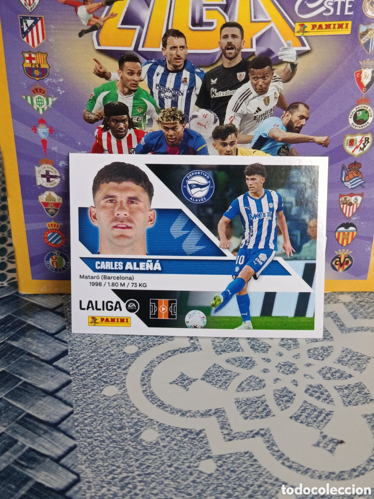 Collectionnisme Cartes &agrave; collectionner anciennes: ALE&Ntilde;A ALAVES N&ordm; 14 LIGA ESTE 26 27 2026 2027 PANINI &rdquo;NUEVO DE SOBRE&rdquo;
