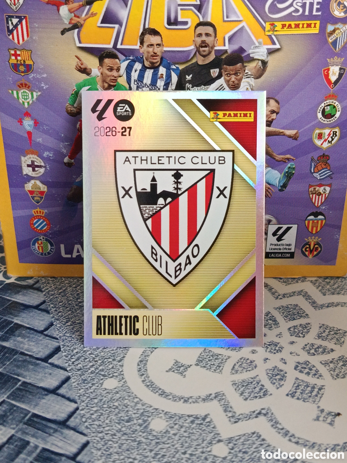 Collectionnisme Cartes &agrave; collectionner anciennes: ESCUDO ATHLETIC CLUB N&ordm; 1 LIGA ESTE 26 27 2026 2027 PANINI &rdquo;NUEVO DE SOBRE&rdquo;