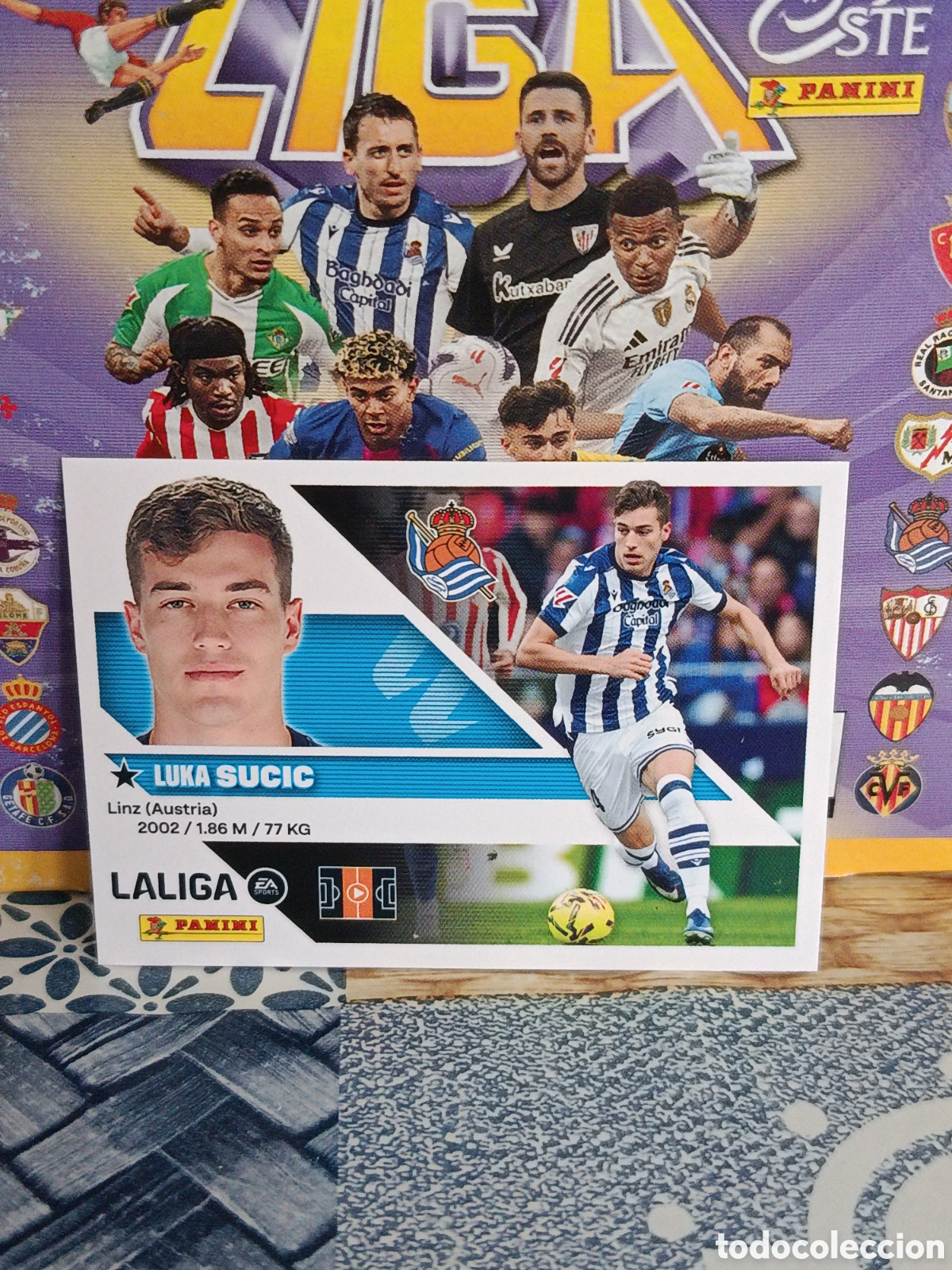 Collezionismo Figurine antiche: SUCIC REAL SOCIEDAD N&ordm; 15 LIGA ESTE 26 27 2026 2027 PANINI
