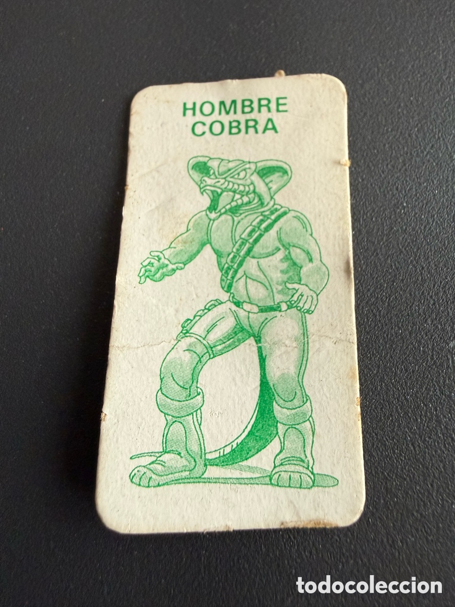 Coleccionismo cromos antiguos: HOMBRE COBRA. Tarjeta antigua IMPERIO COBRA