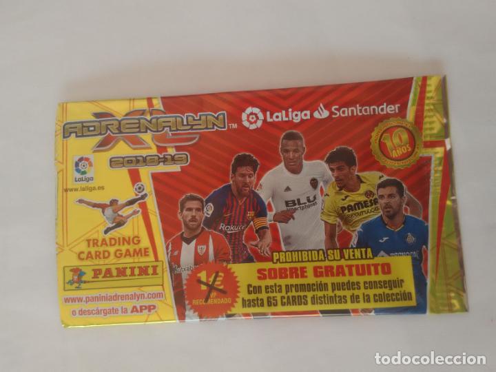 Cromos de F&uacute;tbol: MESSI RODRIGO &Aacute;NGEL &Iacute;&Ntilde;IGO MARTINEZ SOBRE CROMOS VAC&Iacute;O LIGA F&Uacute;TBOL 2018-2019 ADRENALYN 18-19 PANINI