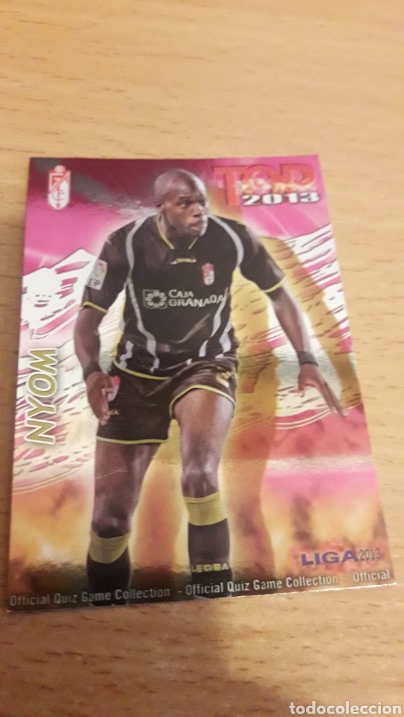 Cromos de f&uacute;tbol: Mundicromo 2013 557 Nyom Granada top fondo fucsia
