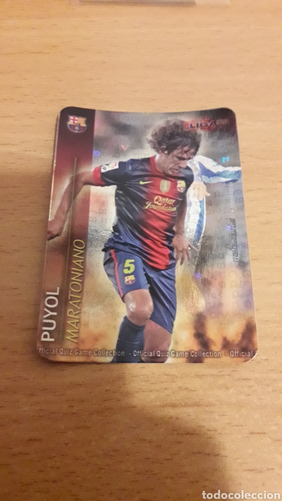 Cromos de Futebol: Mundicromo 2013 Puyol Barcelona maratoniano 4/9 fondo letras puntas redondas