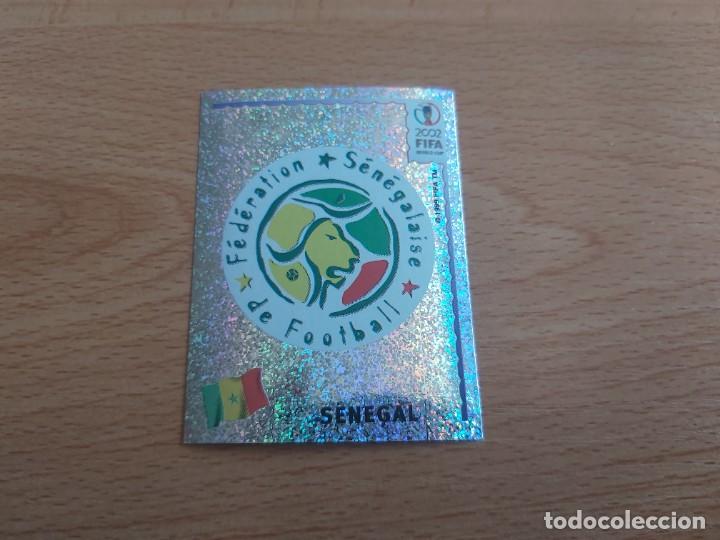 Figurine di Calcio: CROMO FUTBOL MUNDIAL 2002 EDITORIAL PANINI 44.ESCUDO-SENEGAL-NUNCA PEGADO-TRASERA EN NEGRO