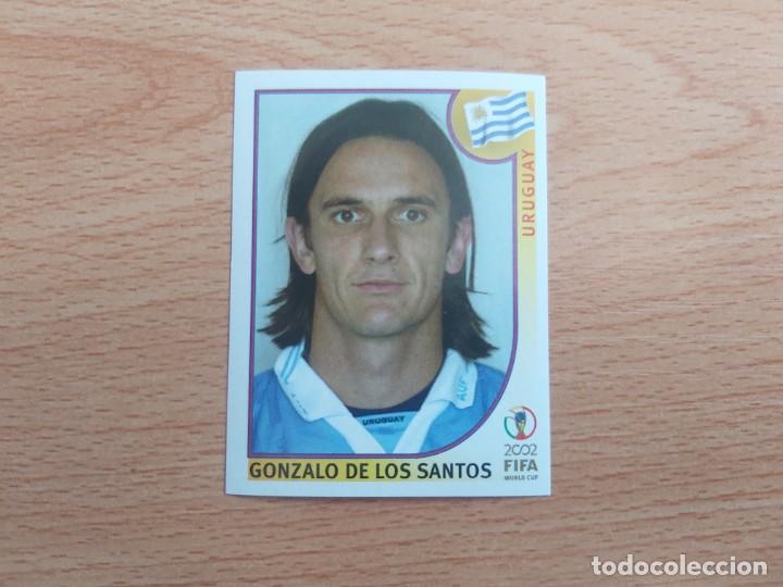 Football Stickers: CROMO FUTBOL MUNDIAL 2002 EDITORIAL PANINI 71.DE LOS SANTOS-URUGUAY-NUNCA PEGADO-TRASERA EN NEGRO