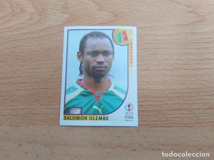 Figurine di Calcio: CROMO FUTBOL MUNDIAL 2002 EDITORIAL PANINI 377.OLEMBE-CAMERUN-NUNCA PEGADO-TRASERA EN NEGRO