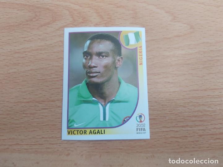 Figurine di Calcio: CROMO FUTBOL MUNDIAL 2002 EDITORIAL PANINI 419.AGALI-NIGERIA-NUNCA PEGADO-TRASERA EN NEGRO