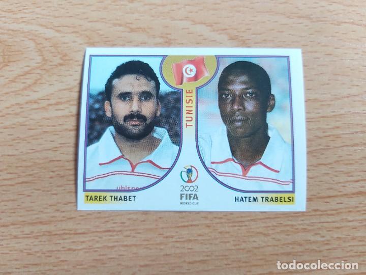 Figurine di Calcio: CROMO FUTBOL MUNDIAL 2002 EDITORIAL PANINI 571.THABET/TRABELSI-TUNEZ-NUNCA PEGADO-TRASERA EN NEGRO
