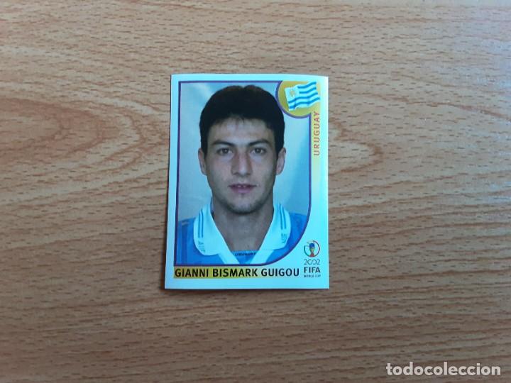 Cromos de Futebol: CROMO FUTBOL MUNDIAL 2002 EDITORIAL PANINI 69.GUIGOU-URUGUAY-NUNCA PEGADO-TRASERA EN AZUL