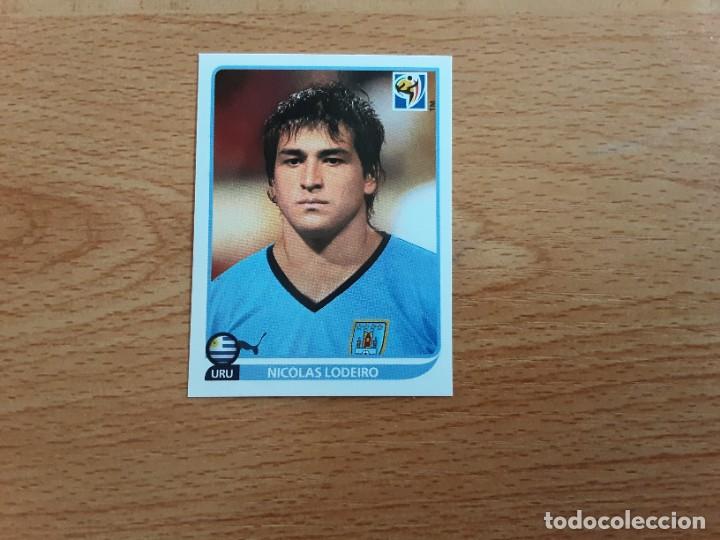 Figurine di Calcio: CROMO FUTBOL MUNDIAL 2010 PANINI 82.LODEIRO-URUGUAY-NUNCA PEGADO