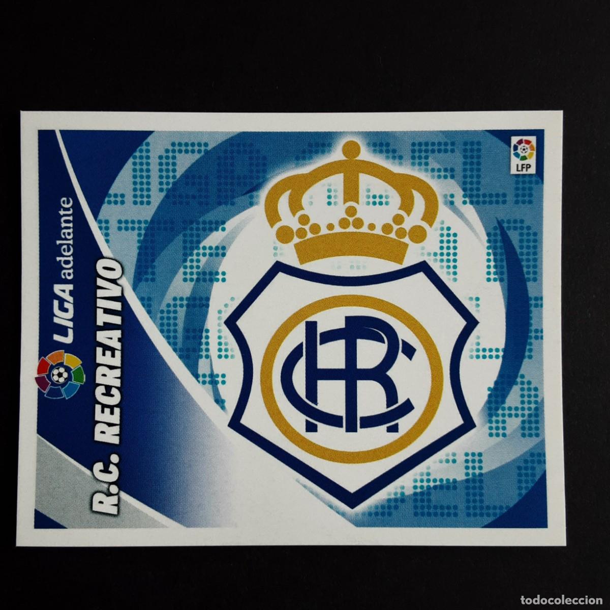 Cromos de f&uacute;tbol: CROMO LIGA 2012 2013 12 13 COLECCIONES ESTE PANINI ESCUDO 2&ordf; DIVISION RECREATIVO HUELVA NUNCA PEGADO