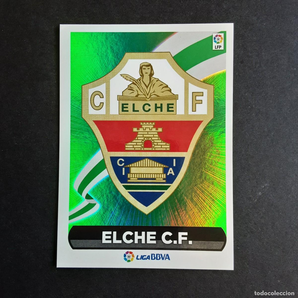 Cromos de f&uacute;tbol: CROMO LIGA 2014 2015 14 15 COLECCIONES ESTE PANINI N&ordm;23 ESCUDO-ELCHE NUNCA PEGADO