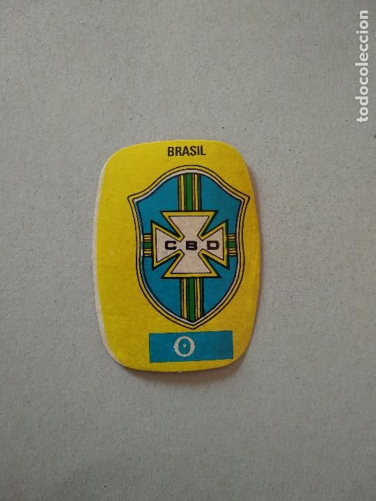 Cromos de F&uacute;tbol: ESCUDO BRASIL ESPA&Ntilde;A 82 CROMO FUTBOL MUNDIAL 1982 REYAUCA EL NARANJITO WORLD CUP