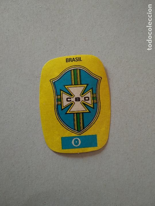 Cromos de F&uacute;tbol: ESCUDO BRASIL ESPA&Ntilde;A 82 CROMO FUTBOL MUNDIAL 1982 REYAUCA EL NARANJITO WORLD CUP