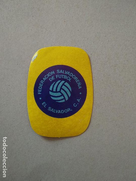 Cromos de F&uacute;tbol: ESCUDO EL SALVADOR ESPA&Ntilde;A 82 CROMO FUTBOL MUNDIAL 1982 REYAUCA EL NARANJITO WORLD CUP
