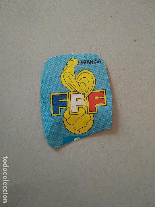 Cromos de F&uacute;tbol: ESCUDO FRANCIA ESPA&Ntilde;A 82 CROMO FUTBOL MUNDIAL 1982 REYAUCA EL NARANJITO WORLD CUP