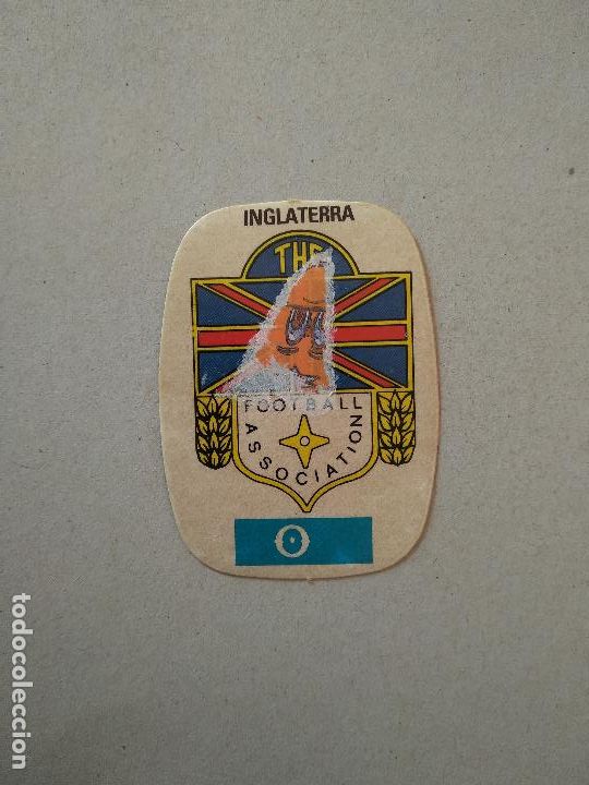 Cromos de F&uacute;tbol: ESCUDO INGLATERRA ESPA&Ntilde;A 82 CROMO FUTBOL MUNDIAL 1982 REYAUCA EL NARANJITO WORLD CUP