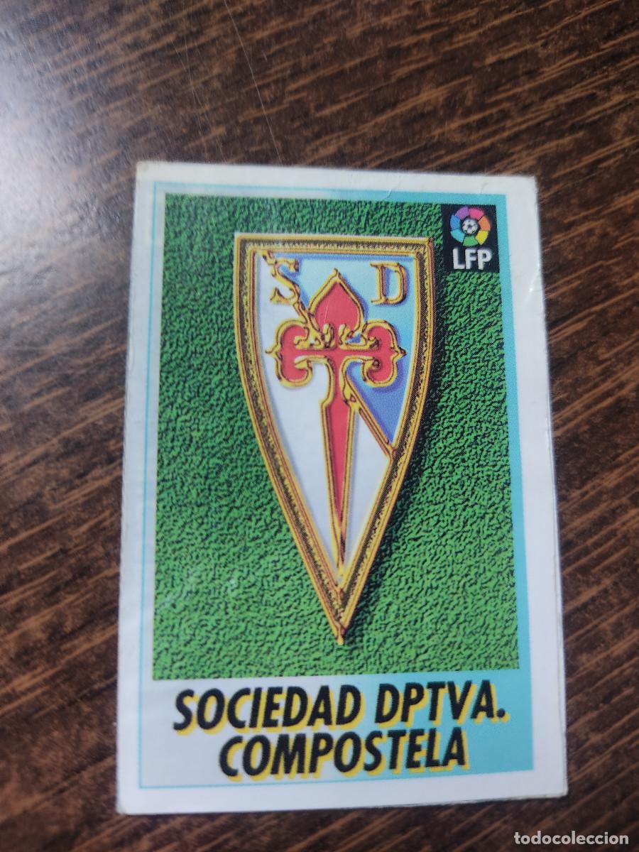 Cromos de Futebol: Bollycao 1996/97 - 53 Escudo - Compostela - Colecci&oacute;n oficial liga espa&ntilde;ola de f&uacute;tbol
