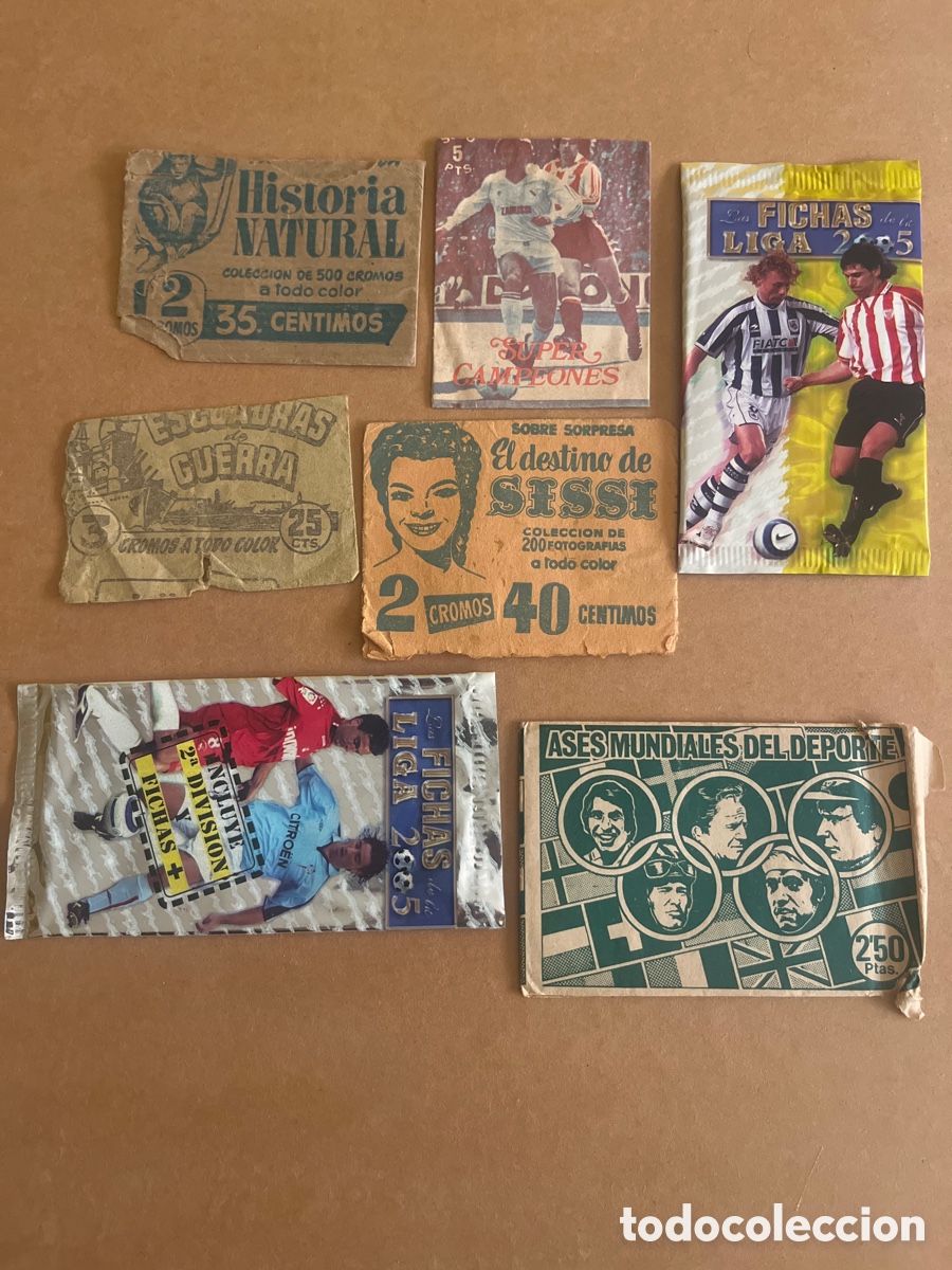 Cromos de f&uacute;tbol: Lote 7 sobres abiertos. Quelcom Mundicromo escuadras guerra etc