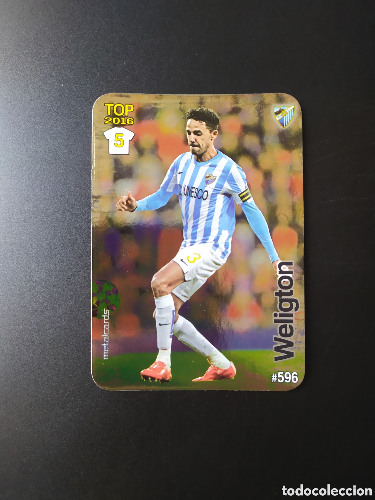 Figurine di Calcio: Mundicromo fichas Liga 2015 2016 15 16 Weligton brillo liso n&deg; 596 M&aacute;laga