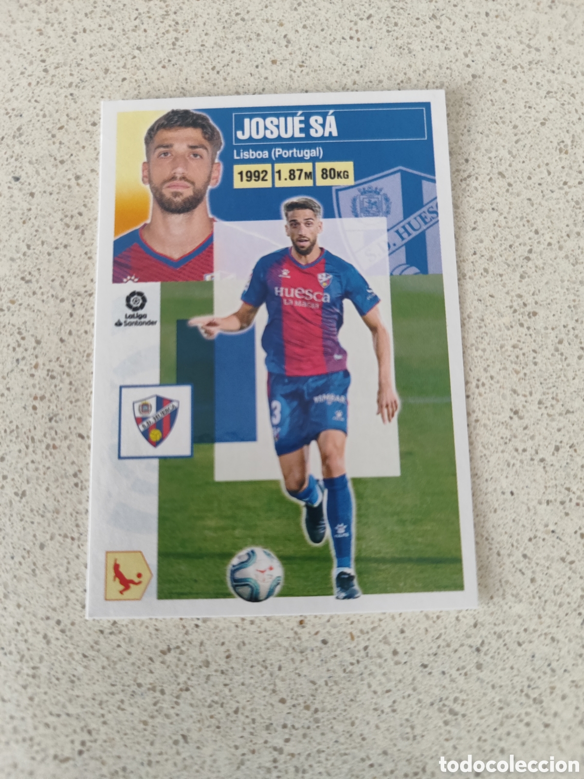 Figurine di Calcio: CROMO JOSU&Eacute; S&Aacute; HUESCA N&Uacute;MERO 6 A. LIGA ESTE 20/21.
