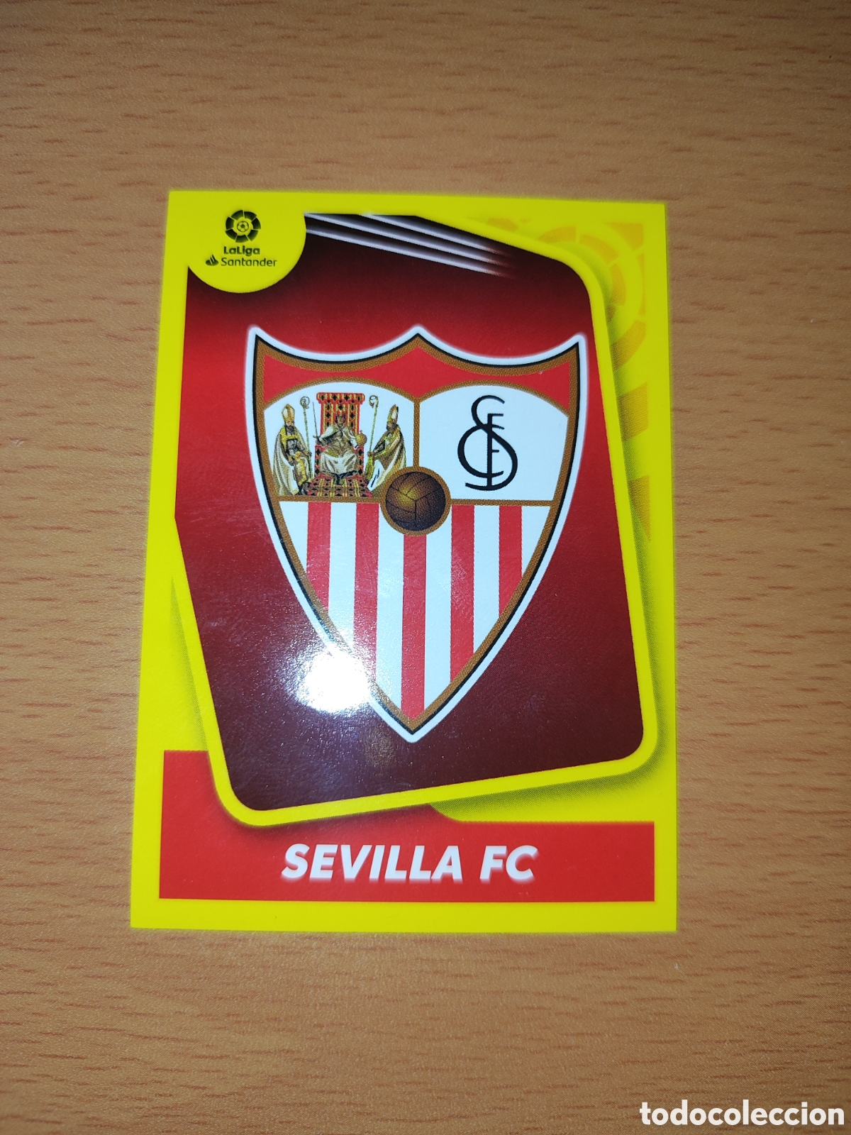 Figurine di Calcio: CROMO ESCUDO SEVILLA N&Uacute;MERO 1. LIGA ESTE 21/22