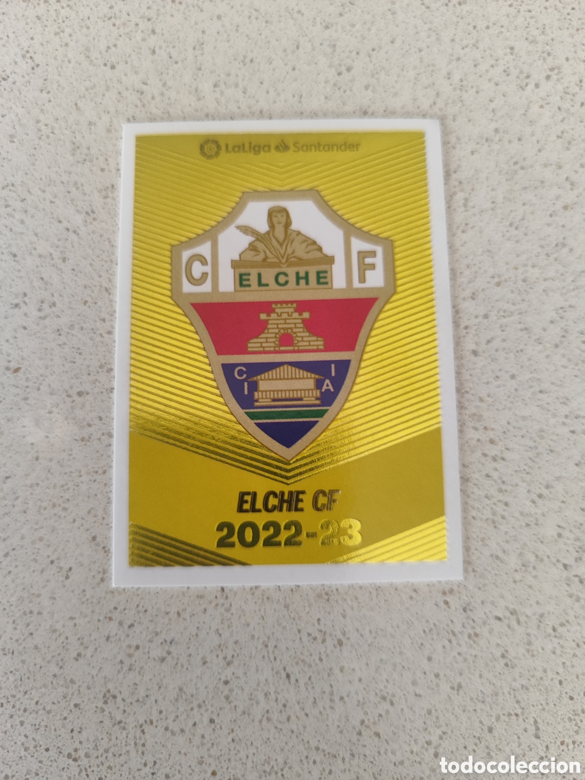 Cromos de F&uacute;tbol: CROMO ESCUDO ELCHE N&Uacute;MERO 1. LIGA ESTE 22/23.