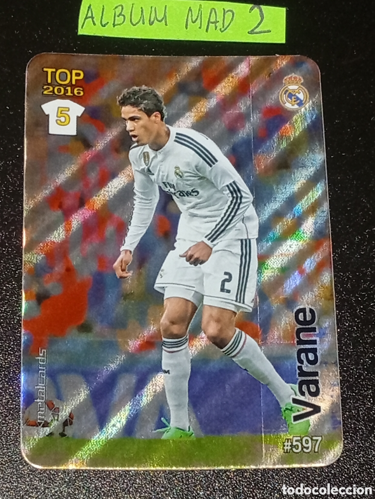 Fu&szlig;ball-Sticker: 597 brillo rayas VARANE REAL MADRID MUNDICROMO 2014 2015 14 15 CROMOS CARDS PANINI TOPPS