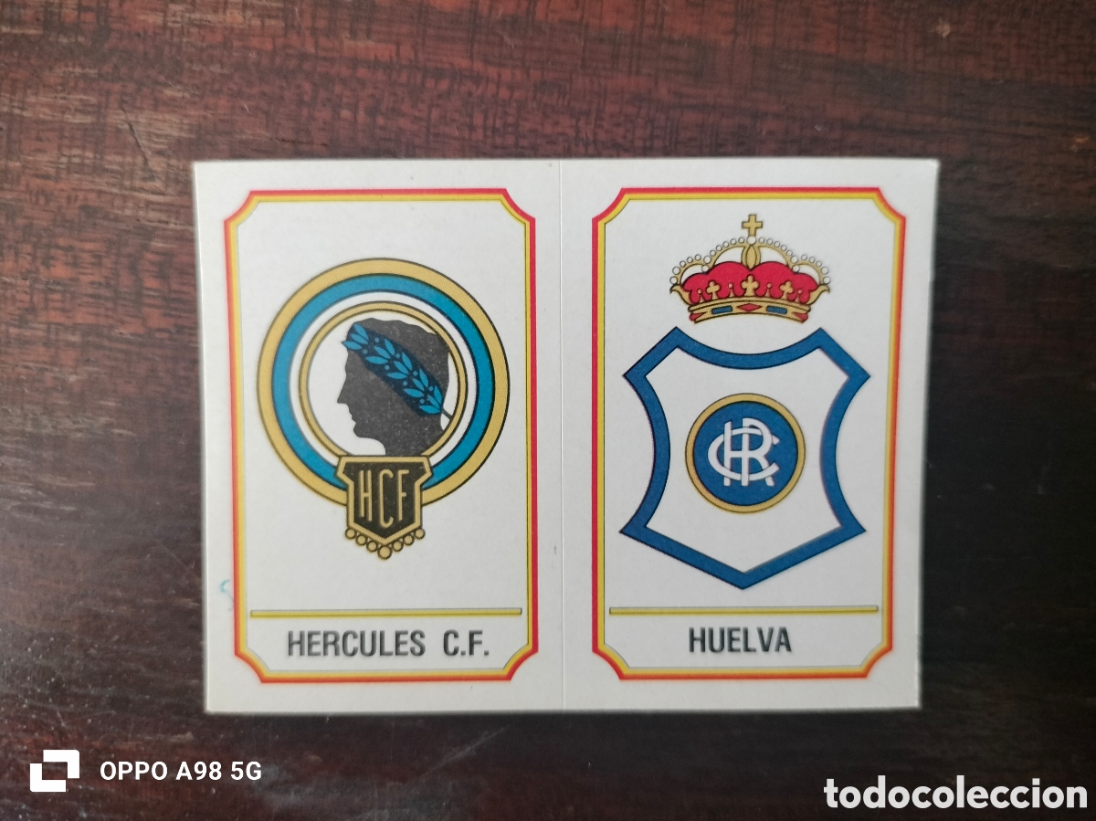 Cromos de F&uacute;tbol: Cromo f&uacute;tbol 83 340 a b Escudos H&eacute;rcules y Huelva Panini cromo crom liga temporada 1982 83