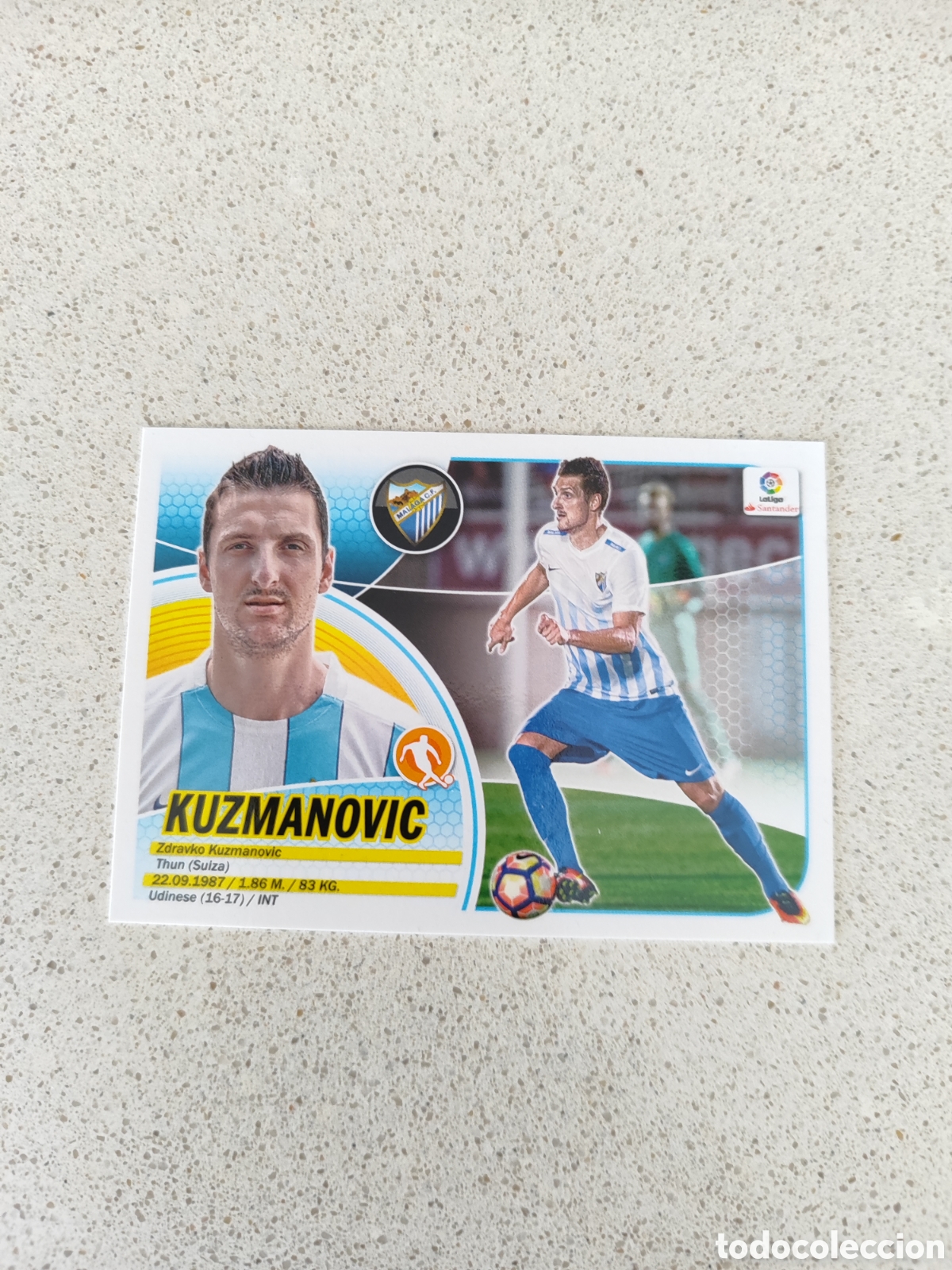 Fu&szlig;ball-Sticker: CROMO KUZMANOVIC M&Aacute;LAGA &Uacute;LTIMO FICHAJE N&Uacute;MERO 14. LIGA ESTE 16/17. SEGUNDA EDICI&Oacute;N.