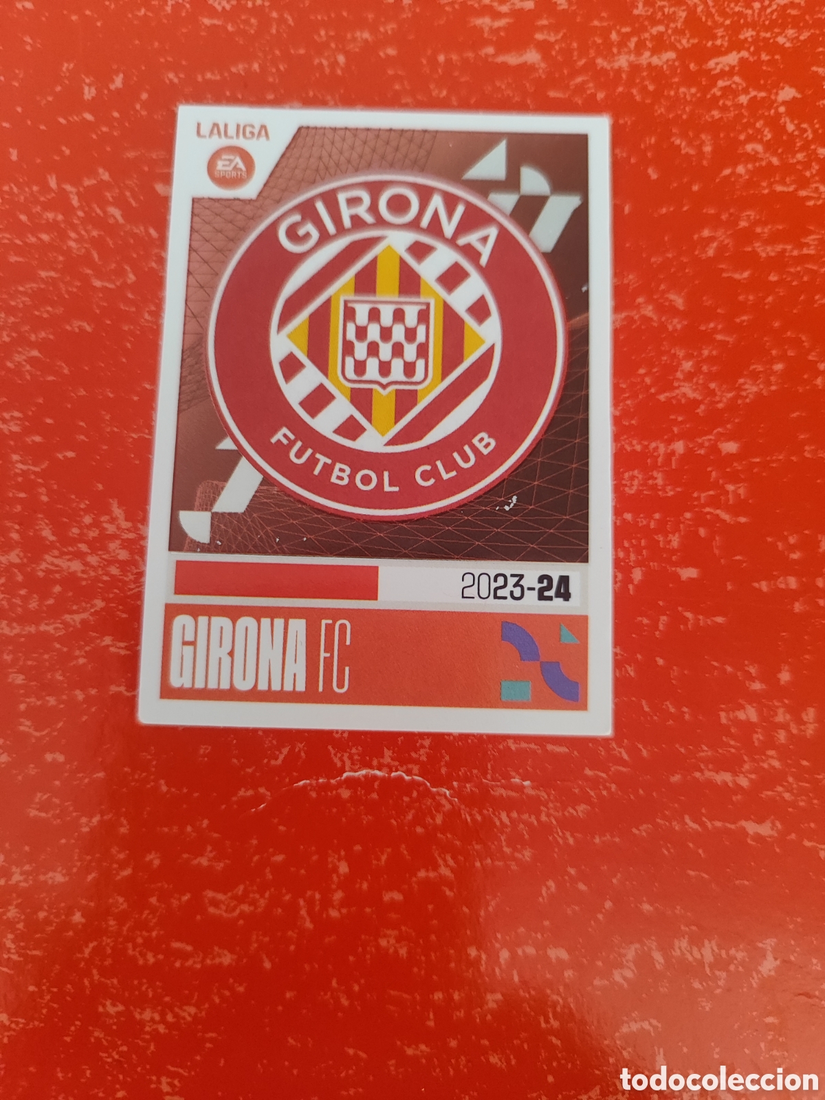 Fu&szlig;ball-Sticker: CROMO ESCUDO GIRONA N&Uacute;MERO 1. LIGA ESTE 23/24.