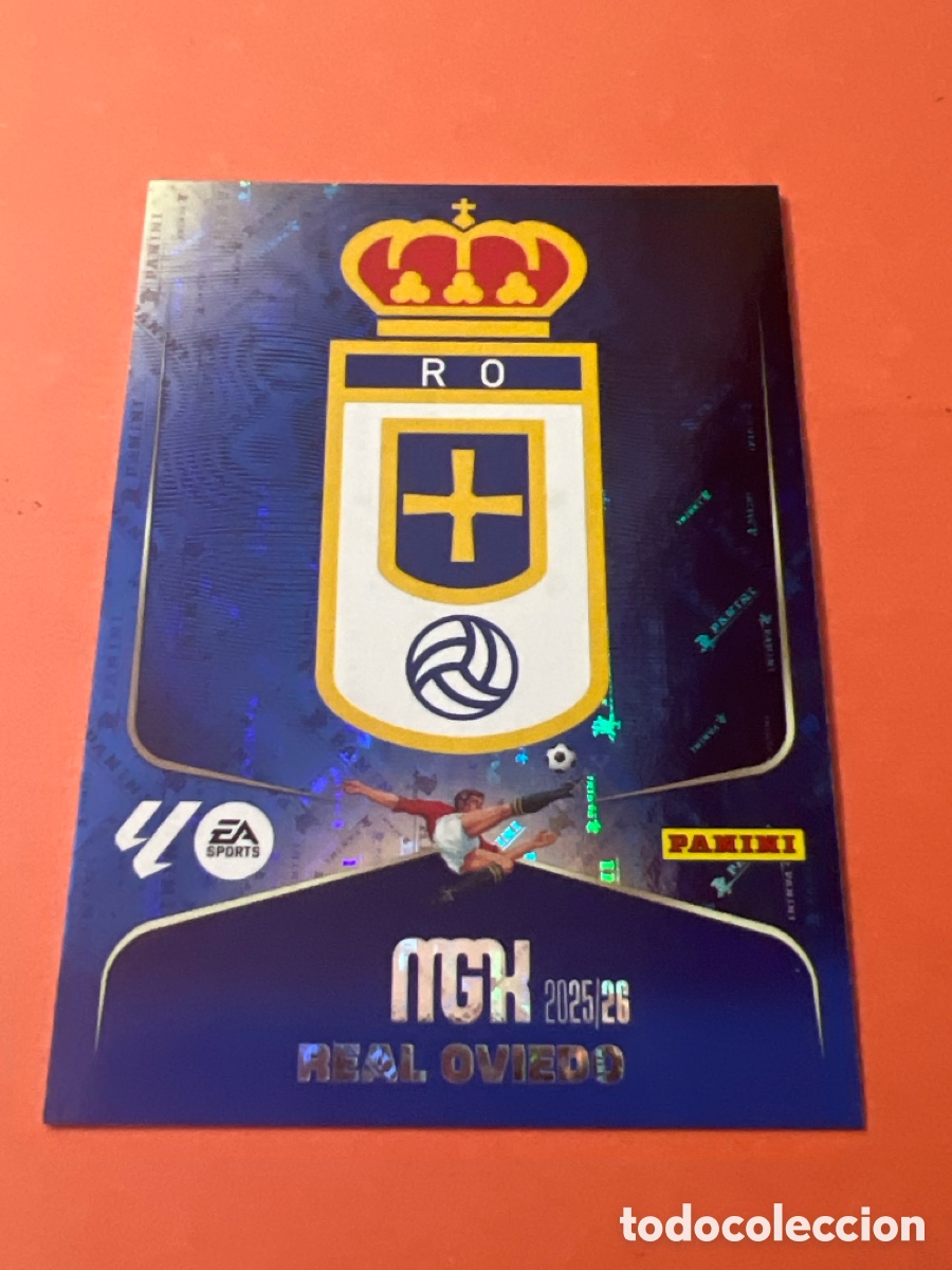 Cromos de Futebol: E917. Escudo 271 Oviedo Megacracks 2025/26 MGK 25-26
