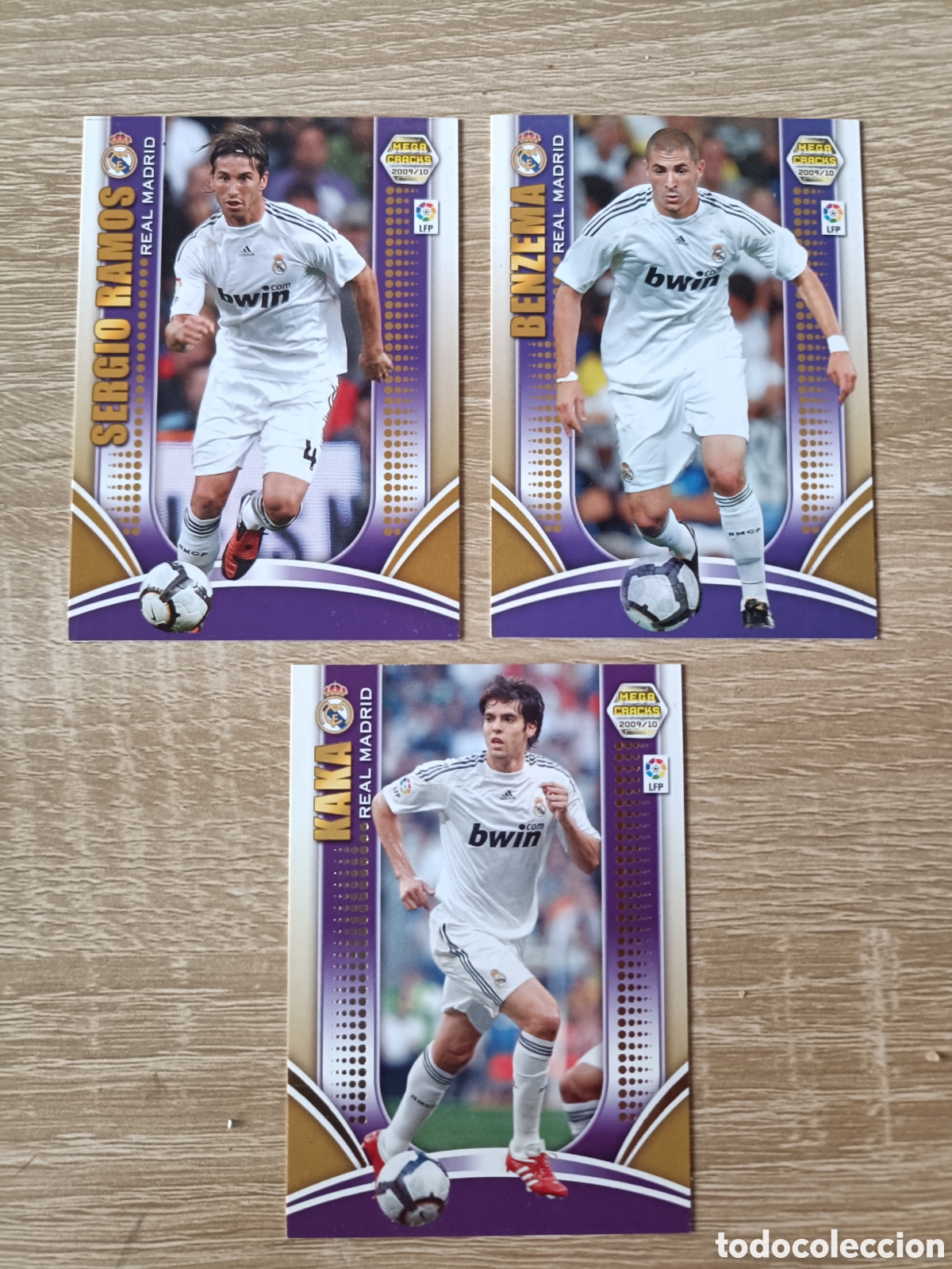 Cromos de F&uacute;tbol: Megacracks 09 10 Benzema Sergio Ramos y Kak&aacute; Serie Oro
