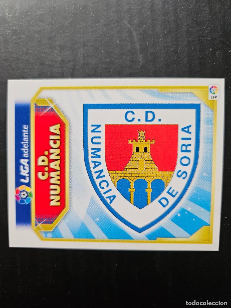 Figurine di Calcio: ESCUDO NUMANCIA LIGA ADELANTE LIGA ESTE 11 12 2011 2012 SIN PEGAR NUNCA PEGADO
