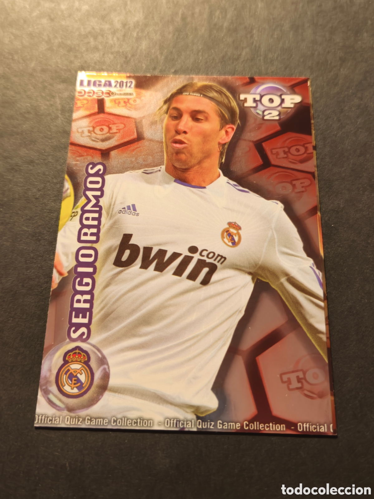 Cromos de F&uacute;tbol: 551 SERGIO RAMOS REAL MADRID MUNDICROMO 2012 TOP2 VERSION FONDO ROJO