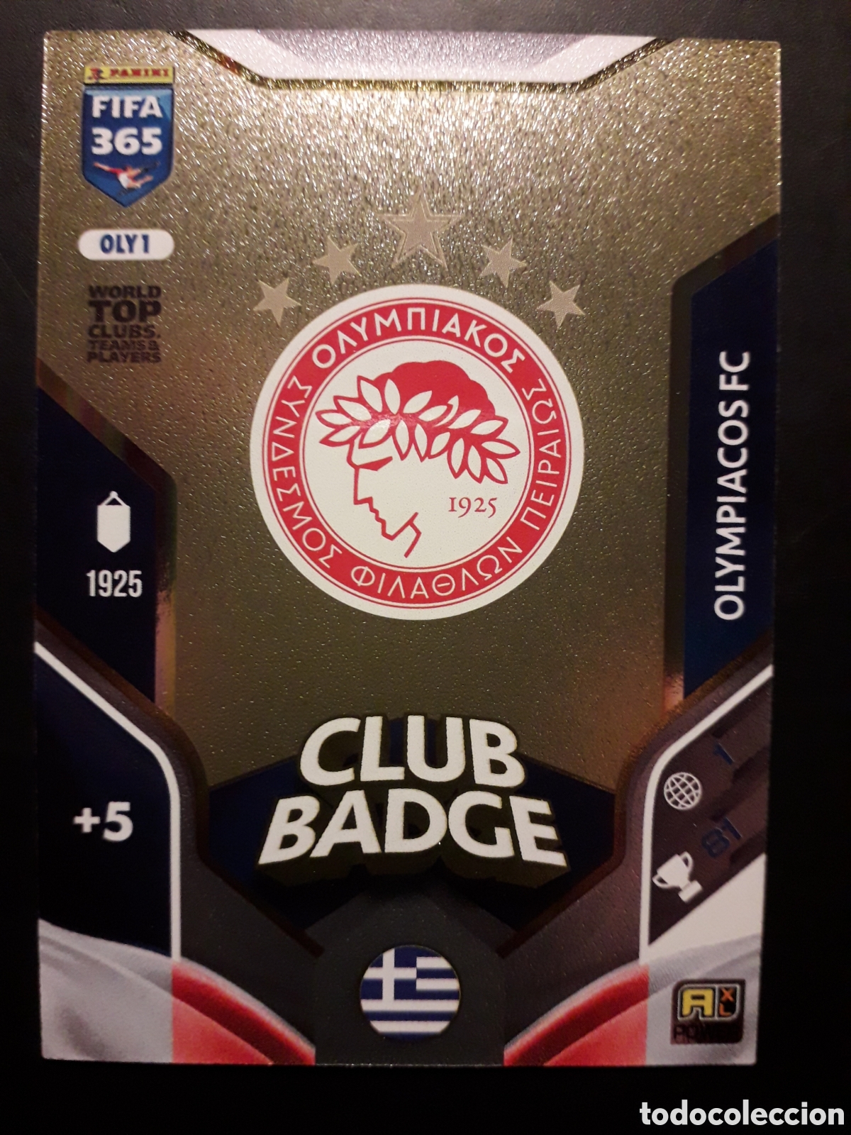 Cromos de f&uacute;tbol: ESCUDO OLIMPIACOS OLY1 B&Aacute;SICA ADRENALYN XL FIFA 365 2026 PEDIDO M&Iacute;NIMO 3&euro;