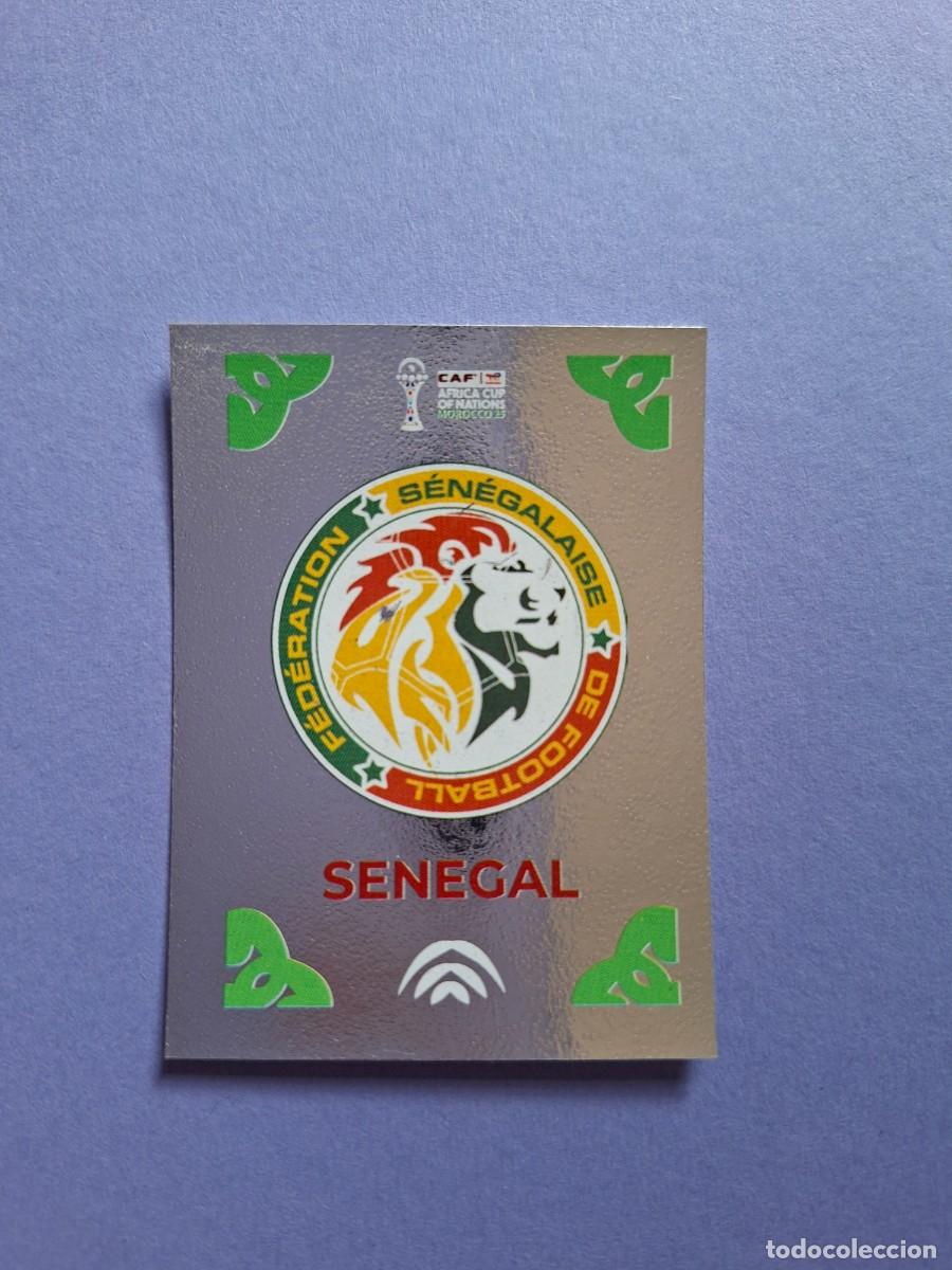 Fu&szlig;ball-Sticker: 261 ESCUDO BADGE SENEGAL FOIL AFRICA CUP MOROCCO 25 CAF COPA DE AFRICA 2025 EDITORIAL SPHINX