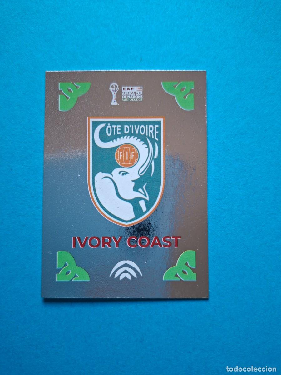 Cromos de F&uacute;tbol: 421 ESCUDO BADGE COSTA DE MARFIL IVORY COAST AFRICA CUP MOROCCO 25 CAF COPA AFRICA 2025 SPHINX